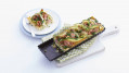 Courgettetaart met geitenkaas, beenham en doperwten