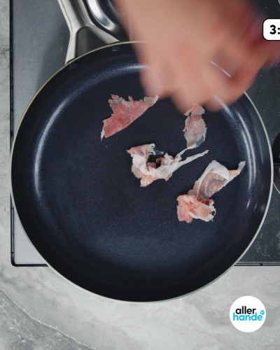 Orzosalade met olijven en prosciutto